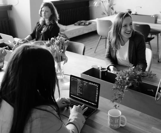 picture of people doing desk work